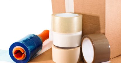 Cardboard,For,Packaging,Adhesive,Tape,And,Nylon,On,White,Background